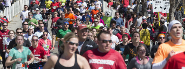 A large crowd participating in a marathon